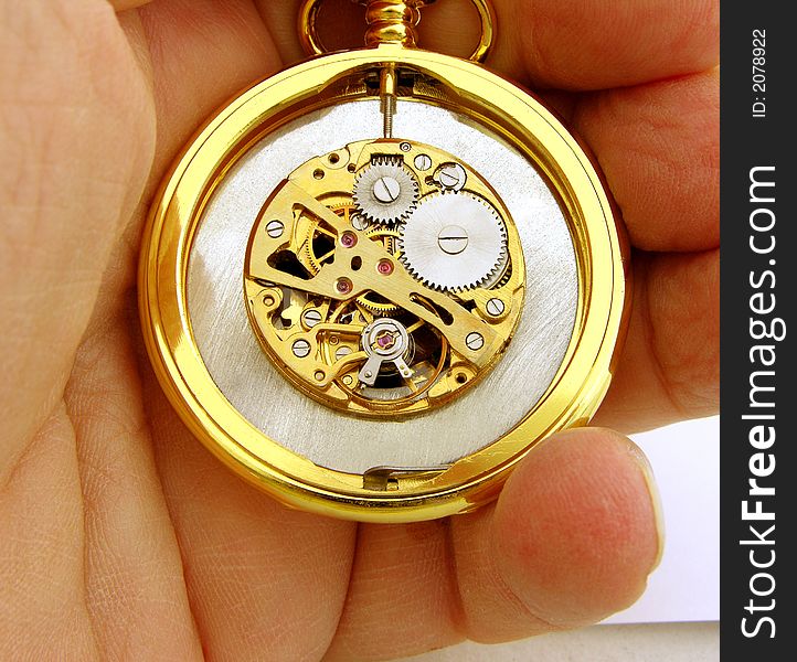 Clockwork pocket watch workings macro example in gold