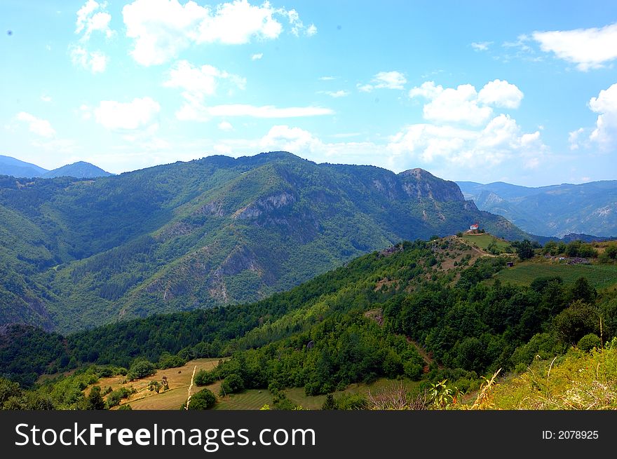 Summer landscape with blue sky