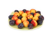 Still Life With Natural Ripe Plums And Peaches Stock Photo