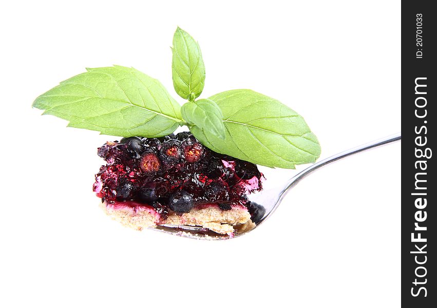 Blueberry Tart: a bite on a fork decorated with mint