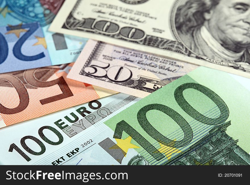 Money: close-up of euro and dollar banknotes. Money: close-up of euro and dollar banknotes