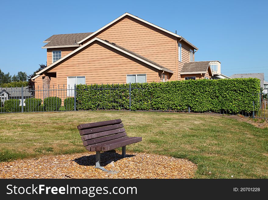 An outdoor bench and house in a Portland suburb, Oregon. An outdoor bench and house in a Portland suburb, Oregon.