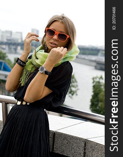 City girl walking outdoor on embankment