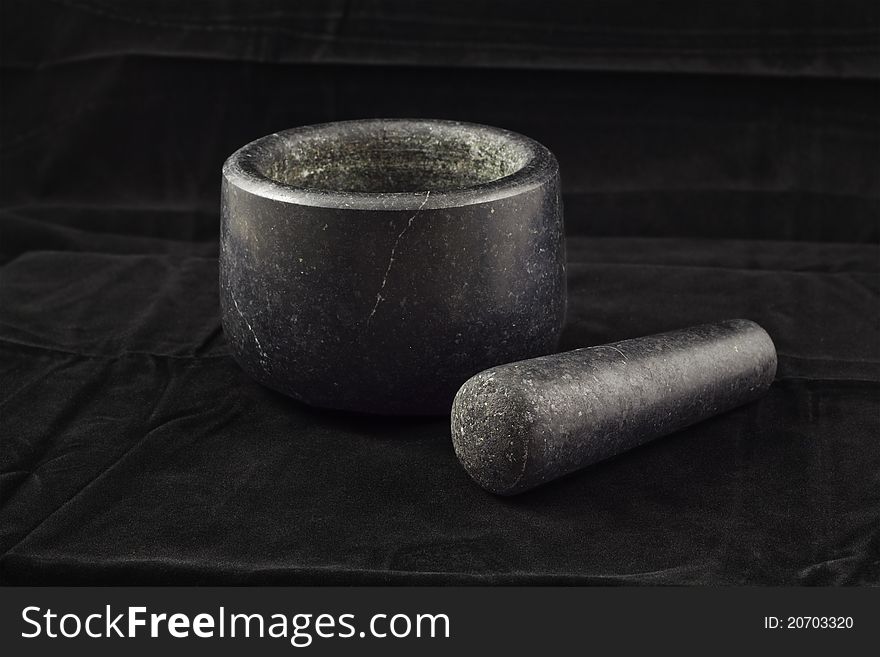 A photo of a mortar and pestle.