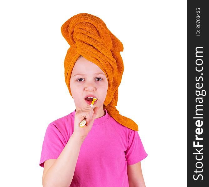 Girl brushing her teeth on a white