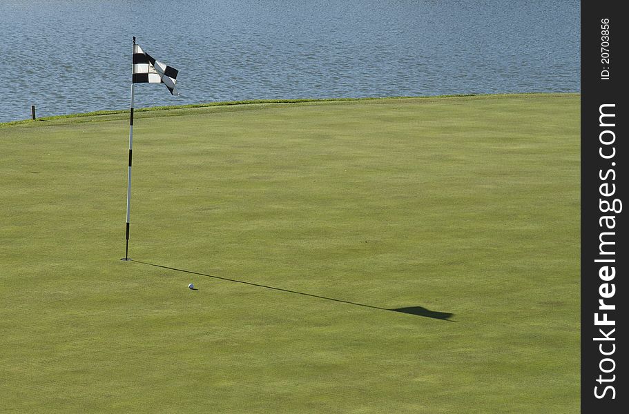 Golf flag in a golf course in South Africa. Golf flag in a golf course in South Africa