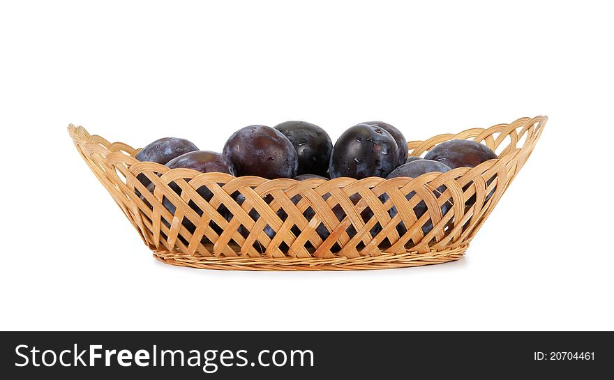 Natural ripe plums on a white background
