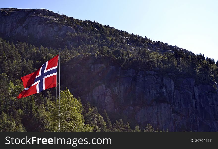 Flag of Norway in front of Mountains