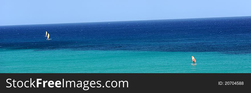 Windsurfing, sea color contrast, relaxation