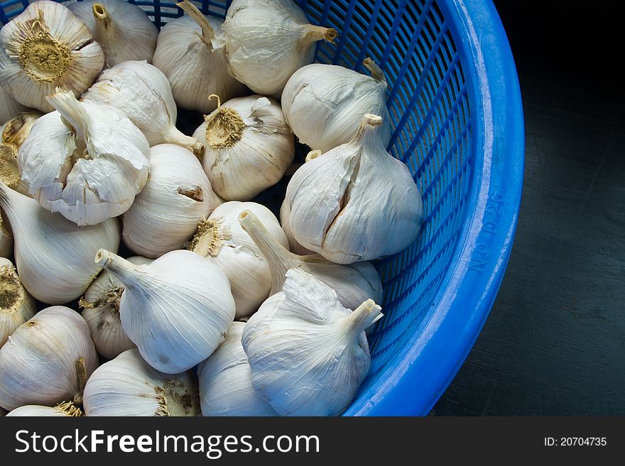 Basket of garlic in Thai kitchen. Basket of garlic in Thai kitchen