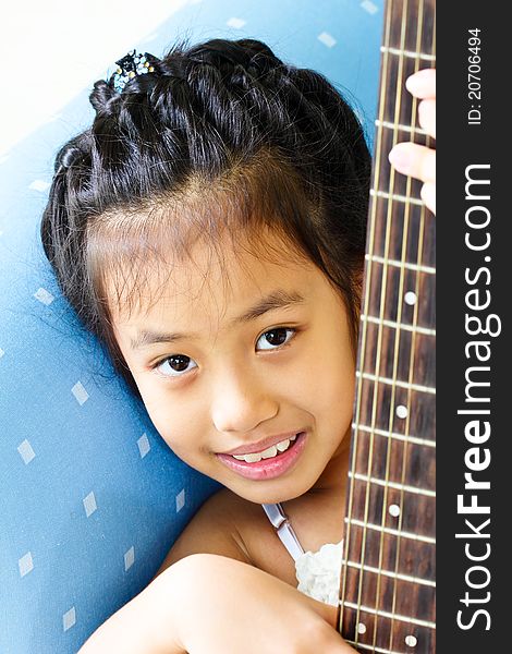 Portrait Young Girl Play With Guitar