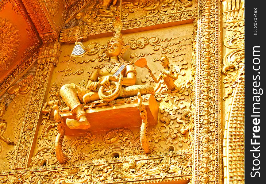 Angel sculture on buddhist temple at Wat Sri Pan Ton, Nan Province, Thailand. Angel sculture on buddhist temple at Wat Sri Pan Ton, Nan Province, Thailand