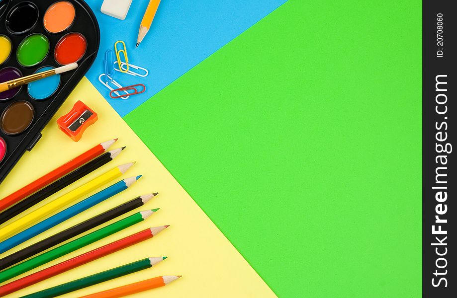 Back to school on colorful paper background