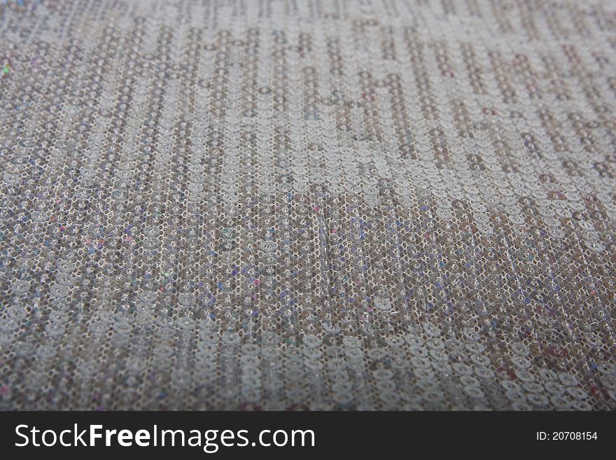 Gray background - material with sequins. Gray background - material with sequins