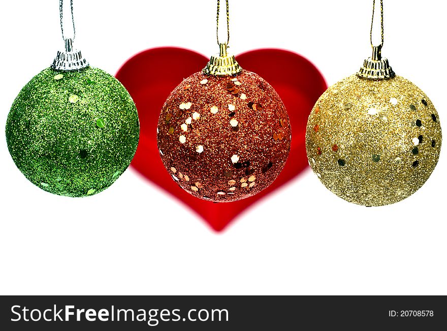 Three Christmas Balls with heart on white background