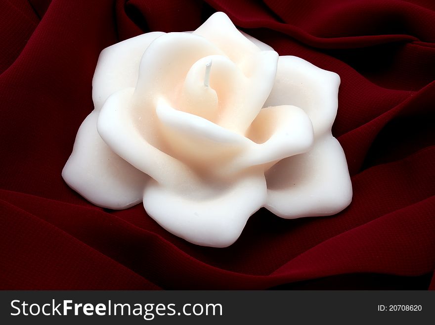 Candle in the shape of rose. Candle in the shape of rose