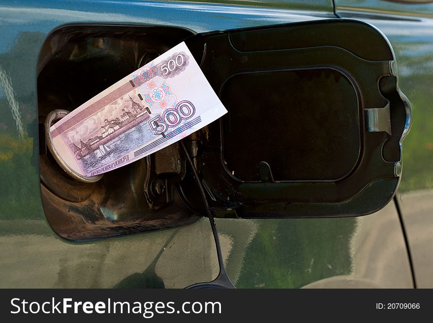 Banknote of 500 roubles is in petrol tank. Banknote of 500 roubles is in petrol tank