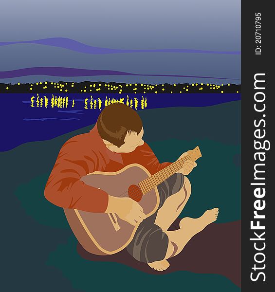 A man with a guitar on the riverbank. Merge with nature.