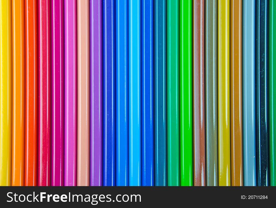 Sets of colored pencils in rows.