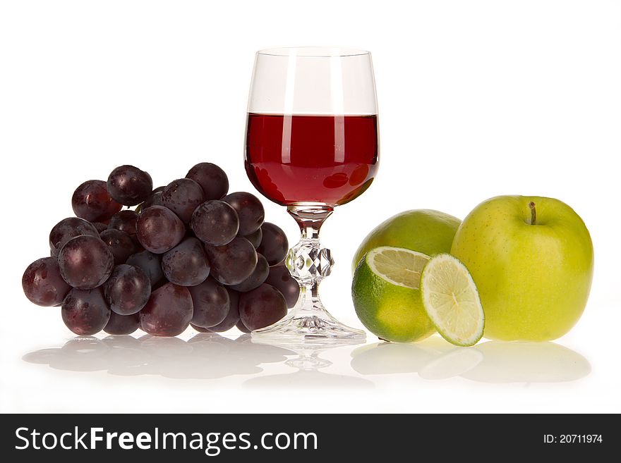 Red wine and fruits on isolated background. Red wine and fruits on isolated background