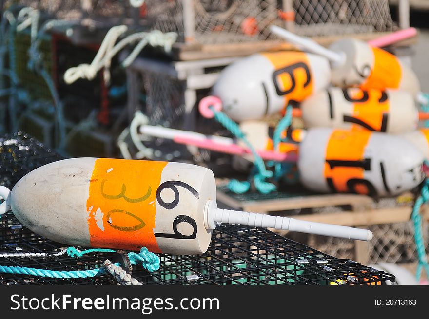 Buoys and ropes standing on libster trap cages. Buoys and ropes standing on libster trap cages