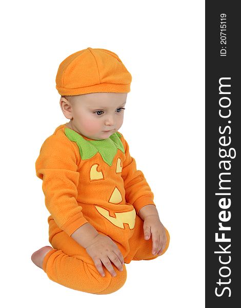 Baby dressed in a pumpkin costume on white background. Baby dressed in a pumpkin costume on white background
