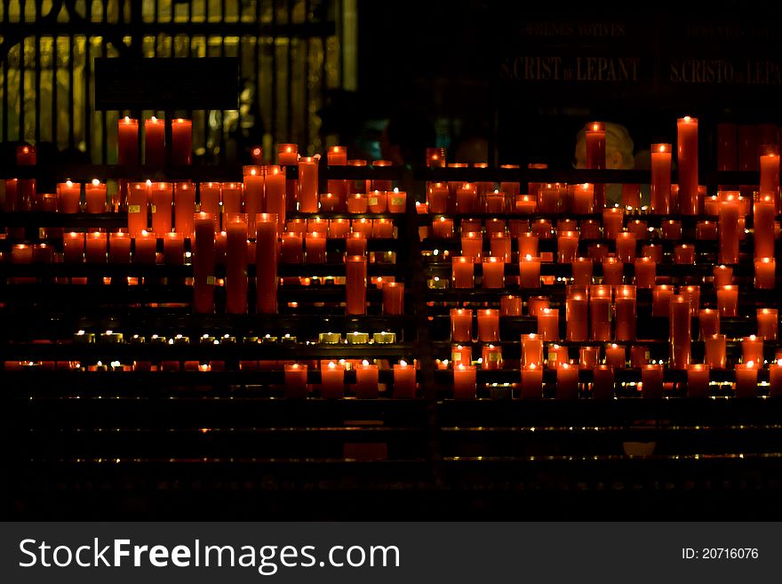 Red Candles in a European church. Red Candles in a European church