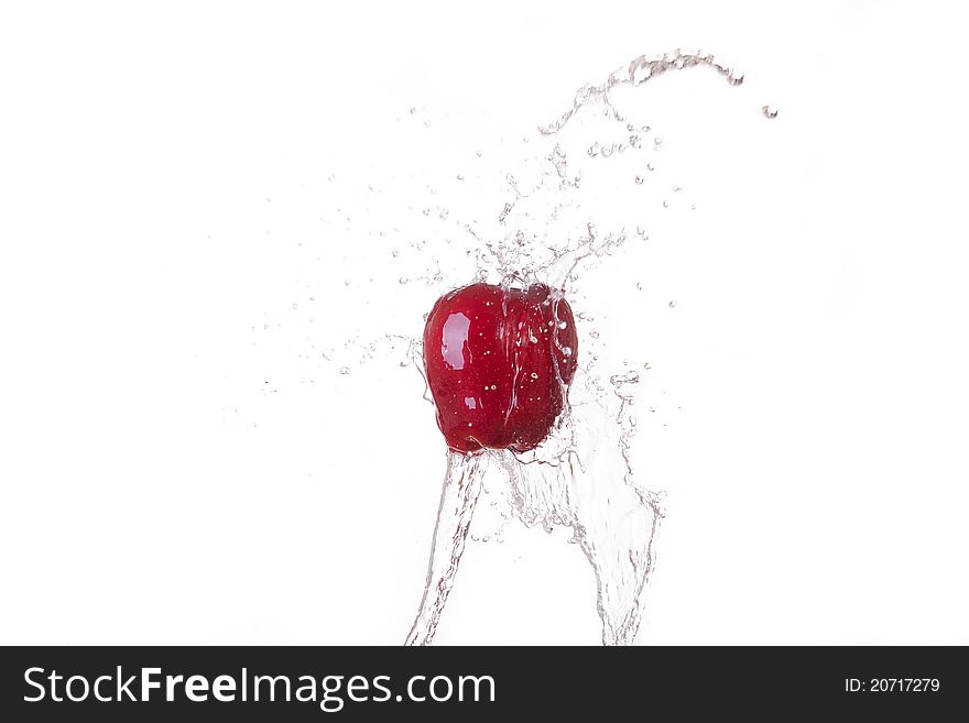 Red Apple With water splash in isolate white background. Red Apple With water splash in isolate white background