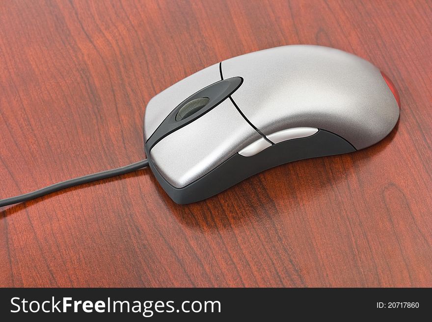 Computer Mouse On Wood Table