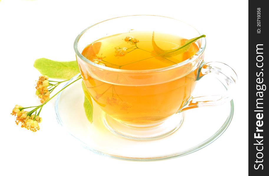 Sup of linden tea on a white background