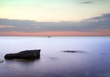 Sea And Rock At The Sunset. Royalty Free Stock Photos