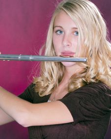Flute Player Isolated On Pink Royalty Free Stock Photos Flute Player Isolated On Pink Royalty Free Stock Photos