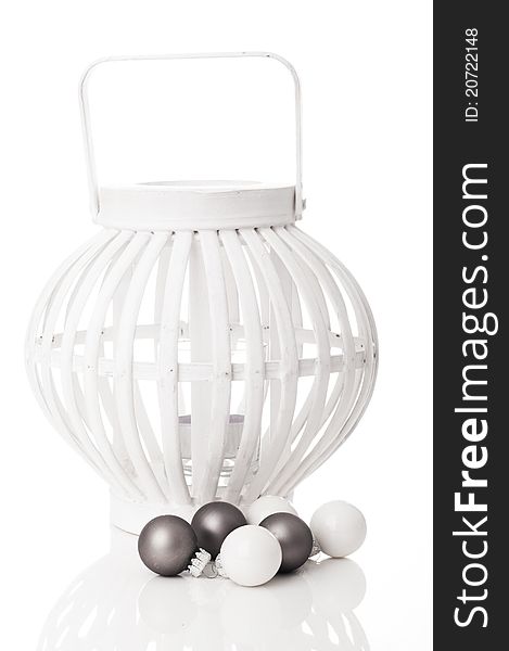 One white decoration lantern with Xmas balls taken in studio for cutout with a white background.