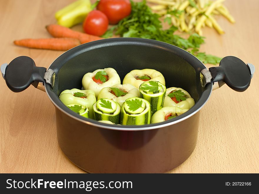 Pan with stuffed peppers and zucchini