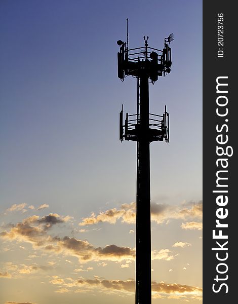 Silhouette of GSM transmitter tower at sunset. Silhouette of GSM transmitter tower at sunset.