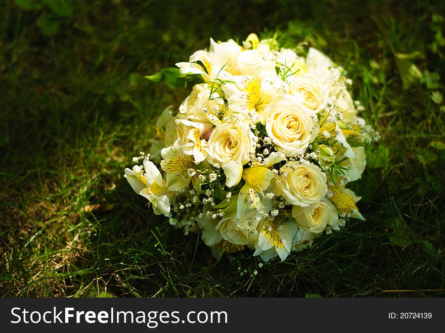 Bridal bouquet on a green meadow. Bridal bouquet on a green meadow