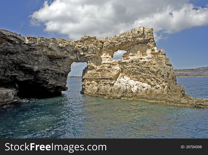 Window on the rock, gozo island, Malta