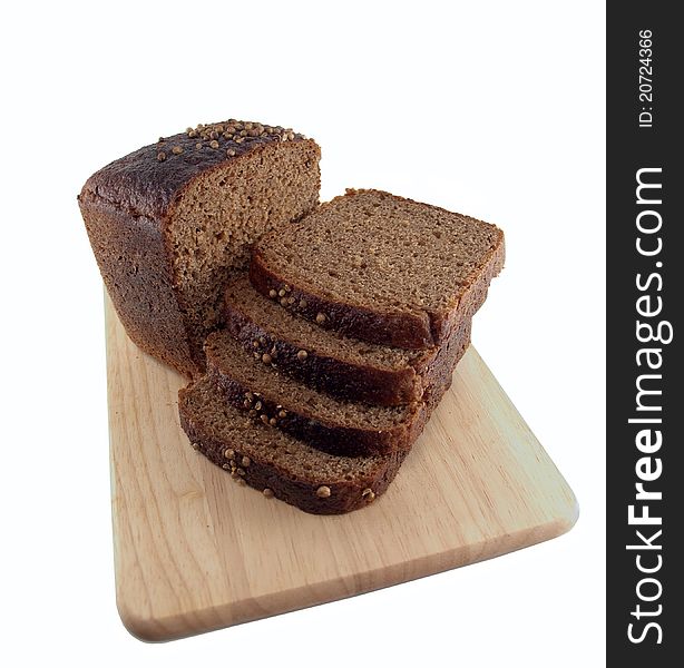 Brown bread slices wooden cutting board on a white background