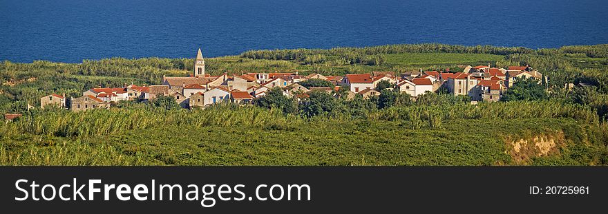 Mediterranean village on Island of Susak, Croatia - village on sandy island in reed and bamboo jungle