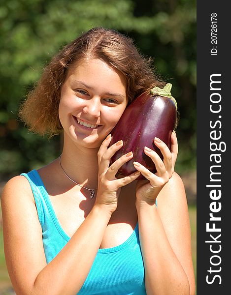 Girl holding a fresh vegetable. Girl holding a fresh vegetable