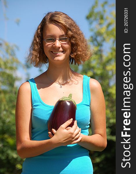 Girl holding a fresh vegetable. Girl holding a fresh vegetable