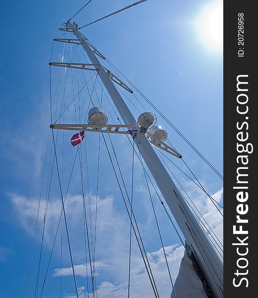 Sails and mast with radar of a modern sail boat boating sailing background. Sails and mast with radar of a modern sail boat boating sailing background
