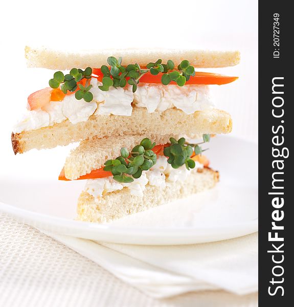 Vegetarian sandwiches with cottage cheese, tomatoes and mustard sprouts