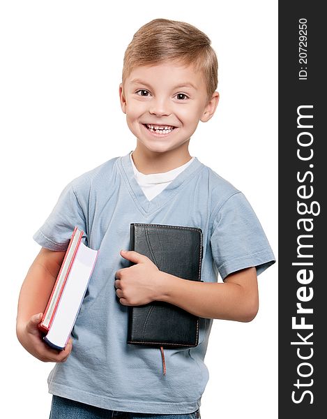 Portrait of a funny little boy holding a books over white background. Portrait of a funny little boy holding a books over white background