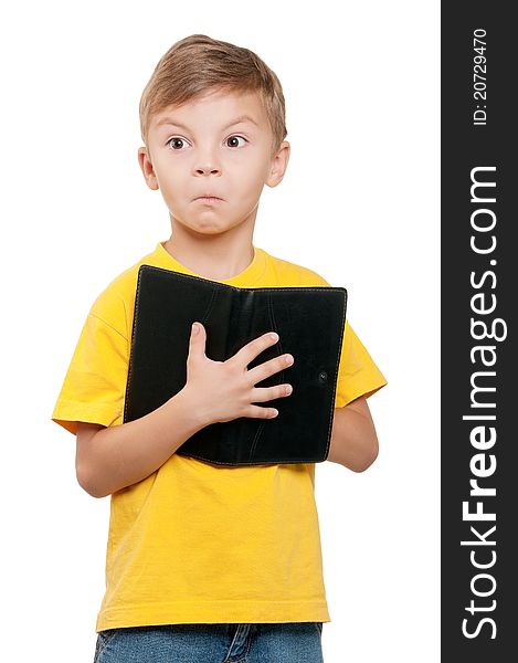 Portrait of little schoolboy with book on white background. Portrait of little schoolboy with book on white background