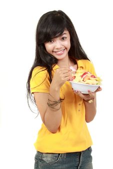 Young Healthy Girl Having A Fruit Salad Royalty Free Stock Photography Young Healthy Girl Having A Fruit Salad Royalty Free Stock Photography