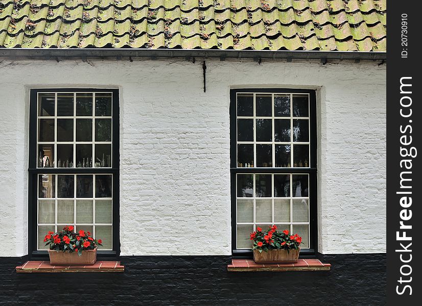 This is an image of a small house on a side street in Bruges, Belgium. This is an image of a small house on a side street in Bruges, Belgium.
