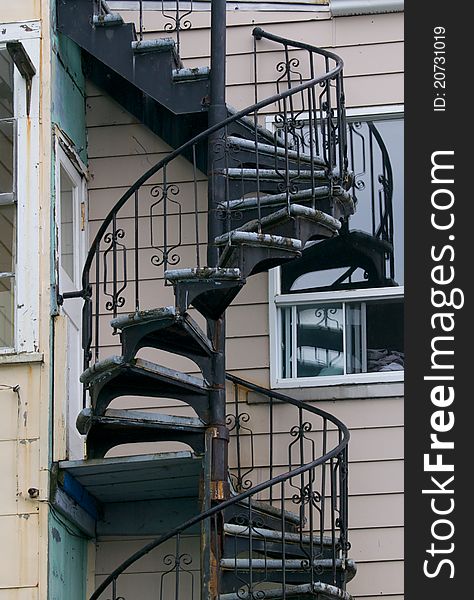 Outdoor weathered spiral wooden staircase. Outdoor weathered spiral wooden staircase