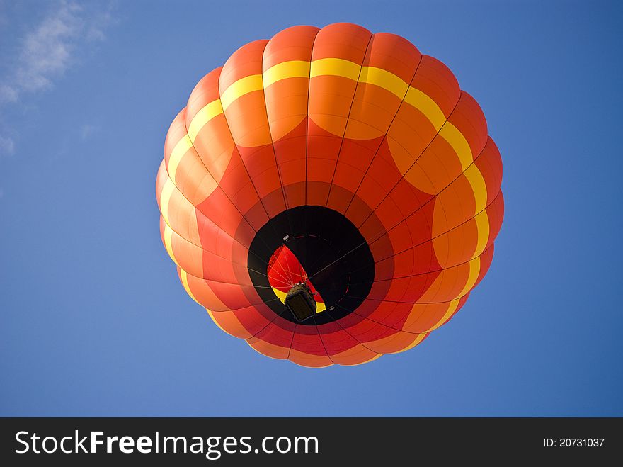 Colorful Hot Air Balloon Ascending into the summer sky. Colorful Hot Air Balloon Ascending into the summer sky