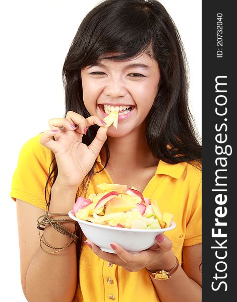 Beauty, young girl holding fruit salad